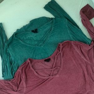 Two long sleeve Rue 21 shirts.